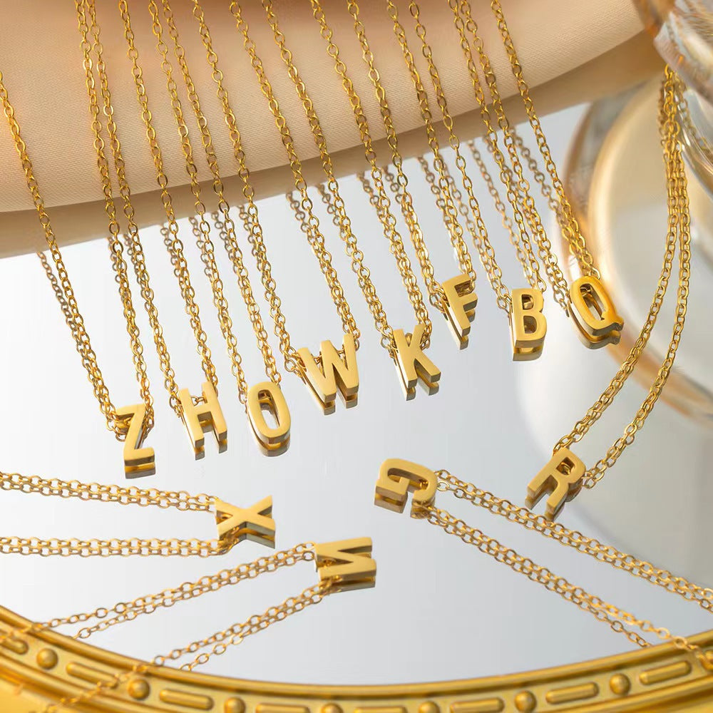 Initial Necklace, gold letter pendants in the A–Z range, flat view
