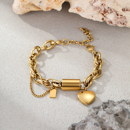 Heart Lock Bracelet, gold chain bracelet with a heart charm and tiny lock, flat view